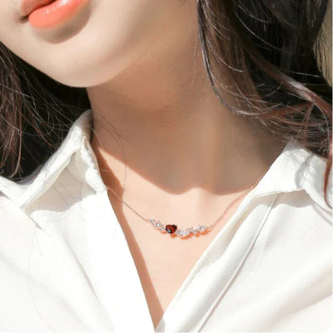 Heart-Cut Garnet Choker Necklace worn at the neckline from a second angle