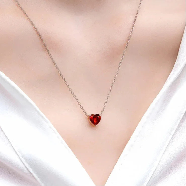 Heart-Cut Garnet Solitaire Necklace worn at the neckline from a second angle