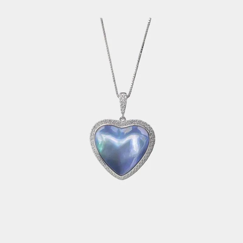 Blue Iridescent Pearl Heart Halo Pendant Necklace — front view of large blue iridescent heart pendant on a silver chain