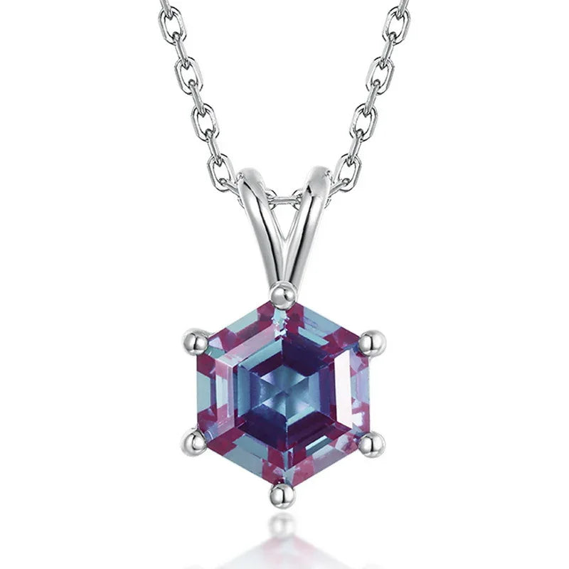 Hexagon Alexandrite pendant necklace with a three-bar bail, center stone close-up on a white background