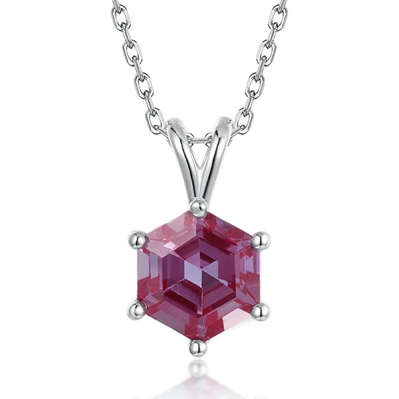 Hexagon Alexandrite pendant necklace with a three-bar bail, pink-toned Alexandrite view under alternate lighting