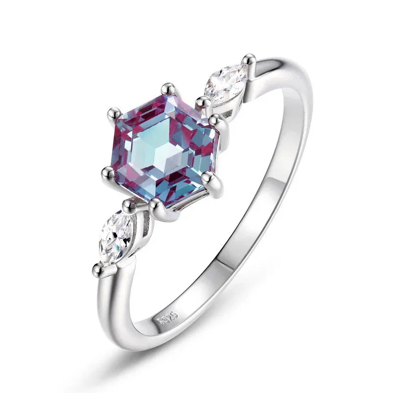 Hexagon Alexandrite ring with marquise-shaped clear accents, alternate front product view on a white background