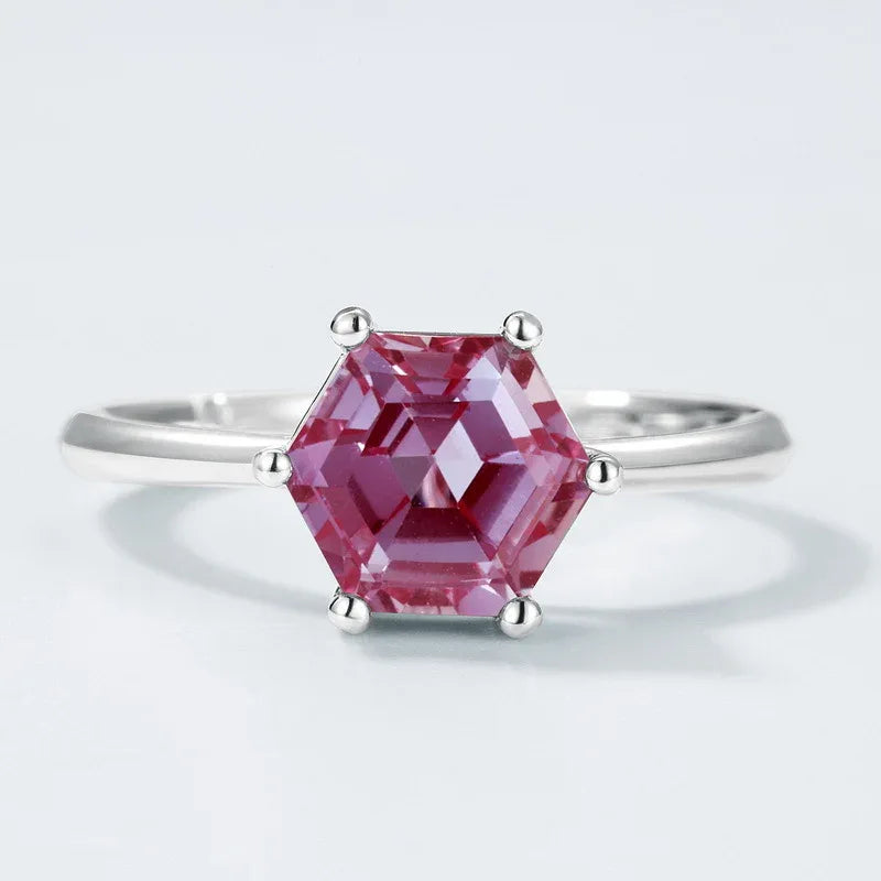Hexagon Alexandrite solitaire ring, alternate pink-toned Alexandrite view under alternate lighting