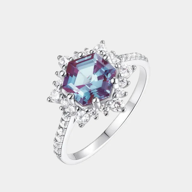 Hexagon Alexandrite sunburst halo ring, front product view on a white background