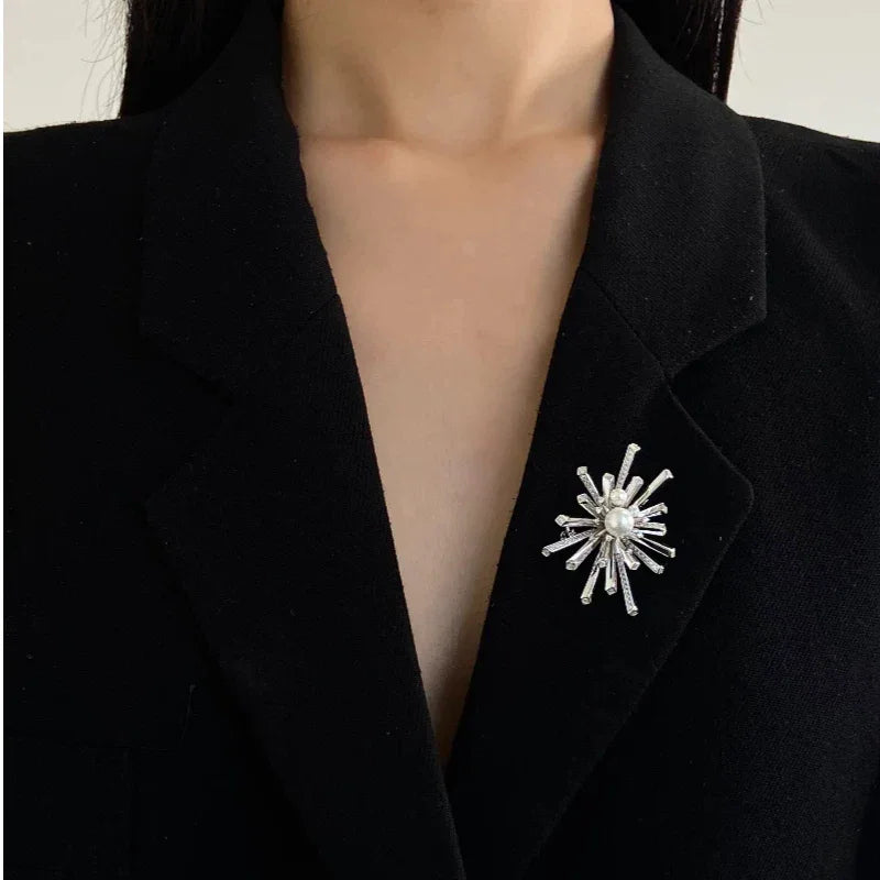 Pearl Starburst Snowflake Brooch — alternate worn view from a slightly different angle