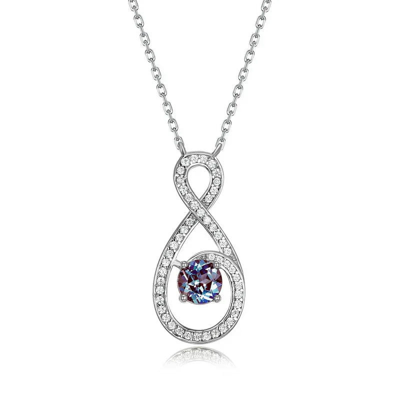 Infinity teardrop necklace with a round Alexandrite, front product view on a white background