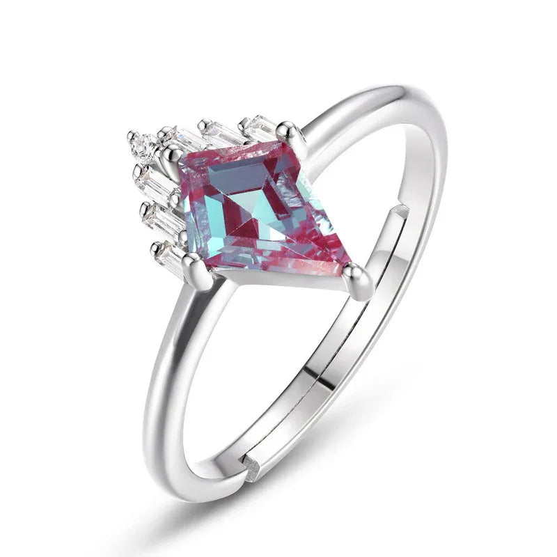 Kite-cut Alexandrite ring with a clear drop accent, alternate front product view on a white background