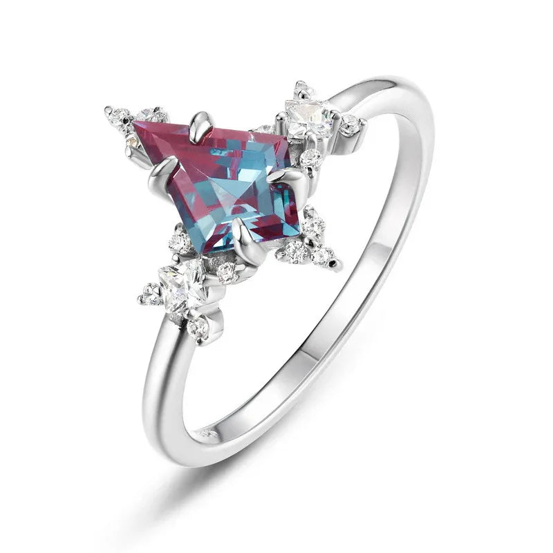 Kite-cut Alexandrite ring with clear halo accents, alternate front product view on a white background