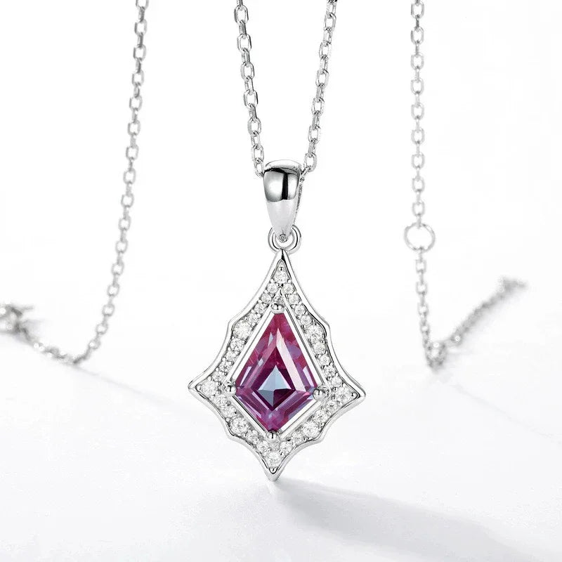 Kite-cut Alexandrite openwork pendant necklace, pink-toned Alexandrite view under alternate lighting