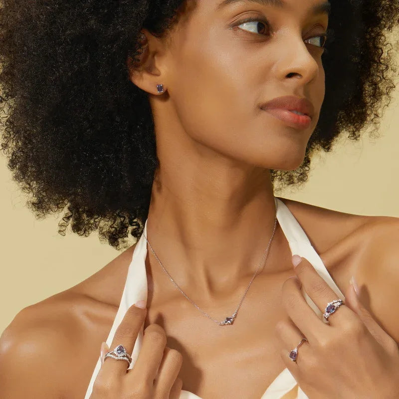 Kite-cut Alexandrite vine collar necklace, shown worn by a model for scale