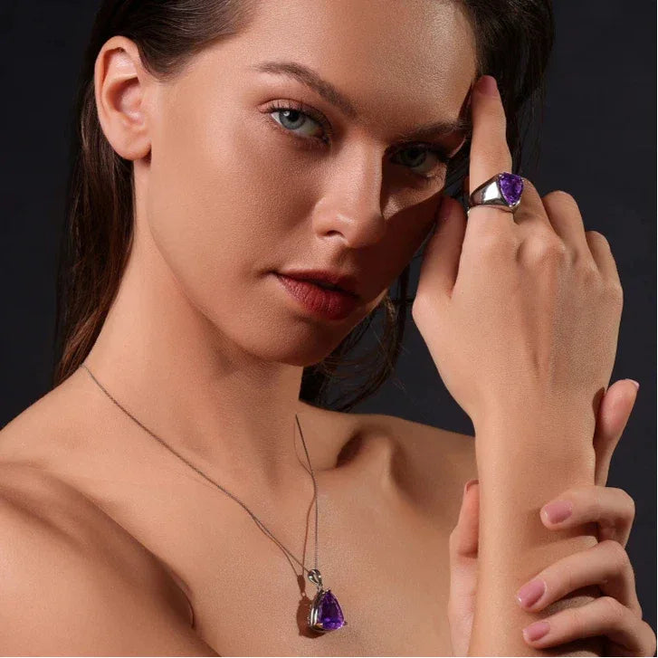 kite-cut amethyst ring worn on the hand from a second angle