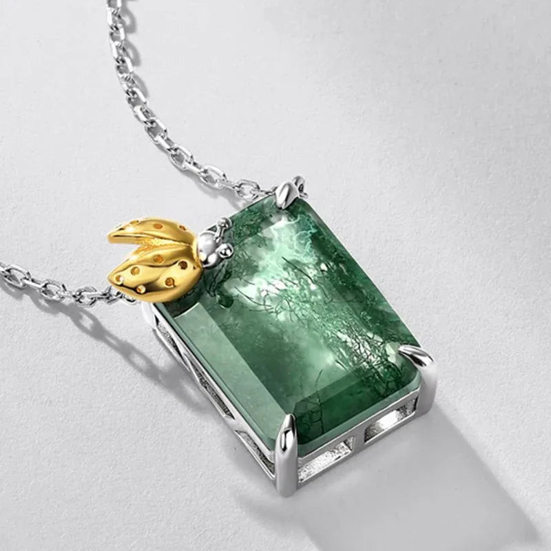 Rectangular Moss Agate Ladybug Accent Pendant Necklace — rectangular pendant and gold-tone ladybug accent close-up