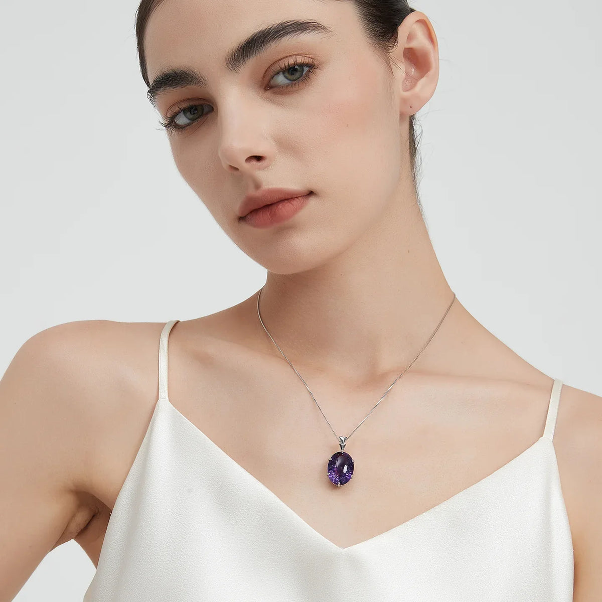 large oval amethyst pendant necklace styled model view showing pendant scale