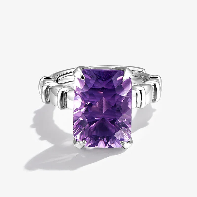 rectangular amethyst solitaire ring angled product view on a white background