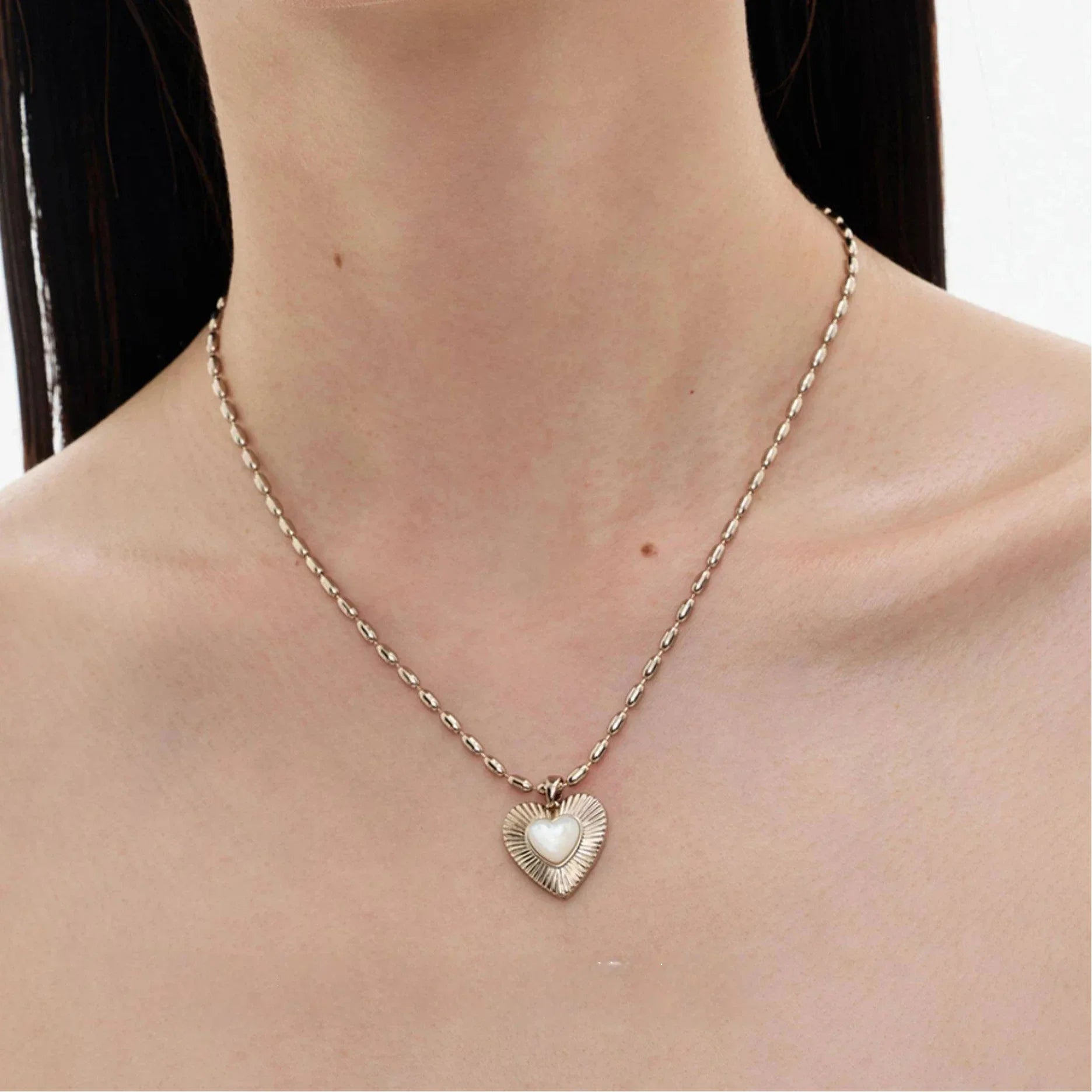 Double-Layer Pearl Heart Necklace — alternate neckline-worn view with the heart centered