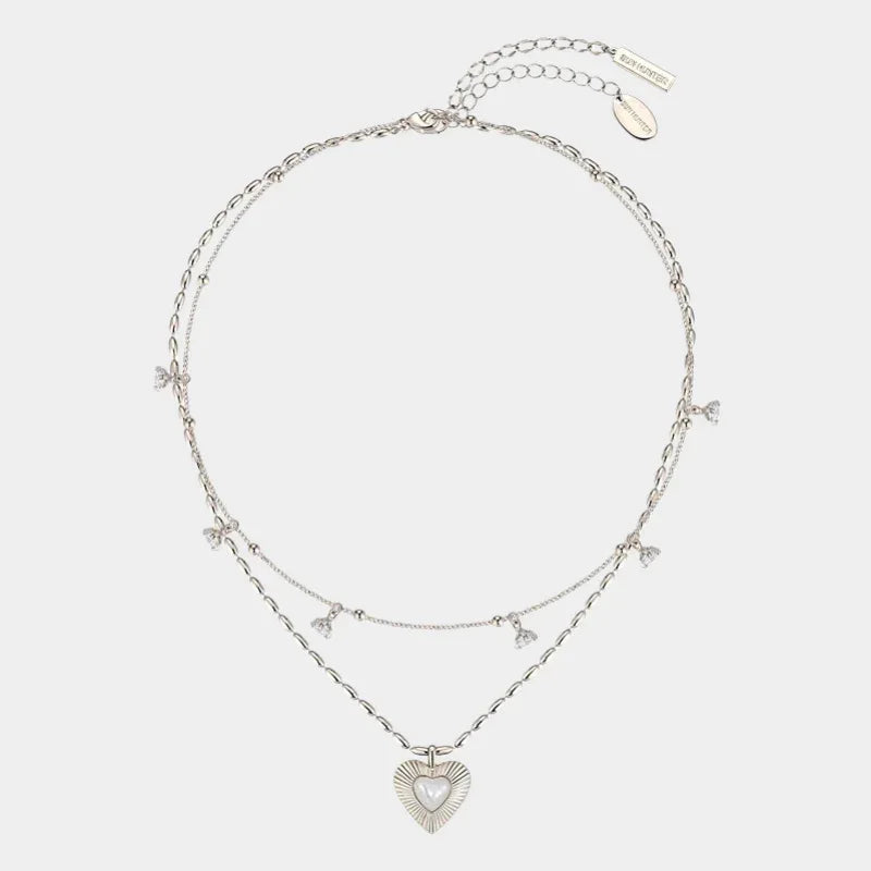 Double-Layer Pearl Heart Necklace — front view of two-layer necklace with pearl heart pendant and small bow