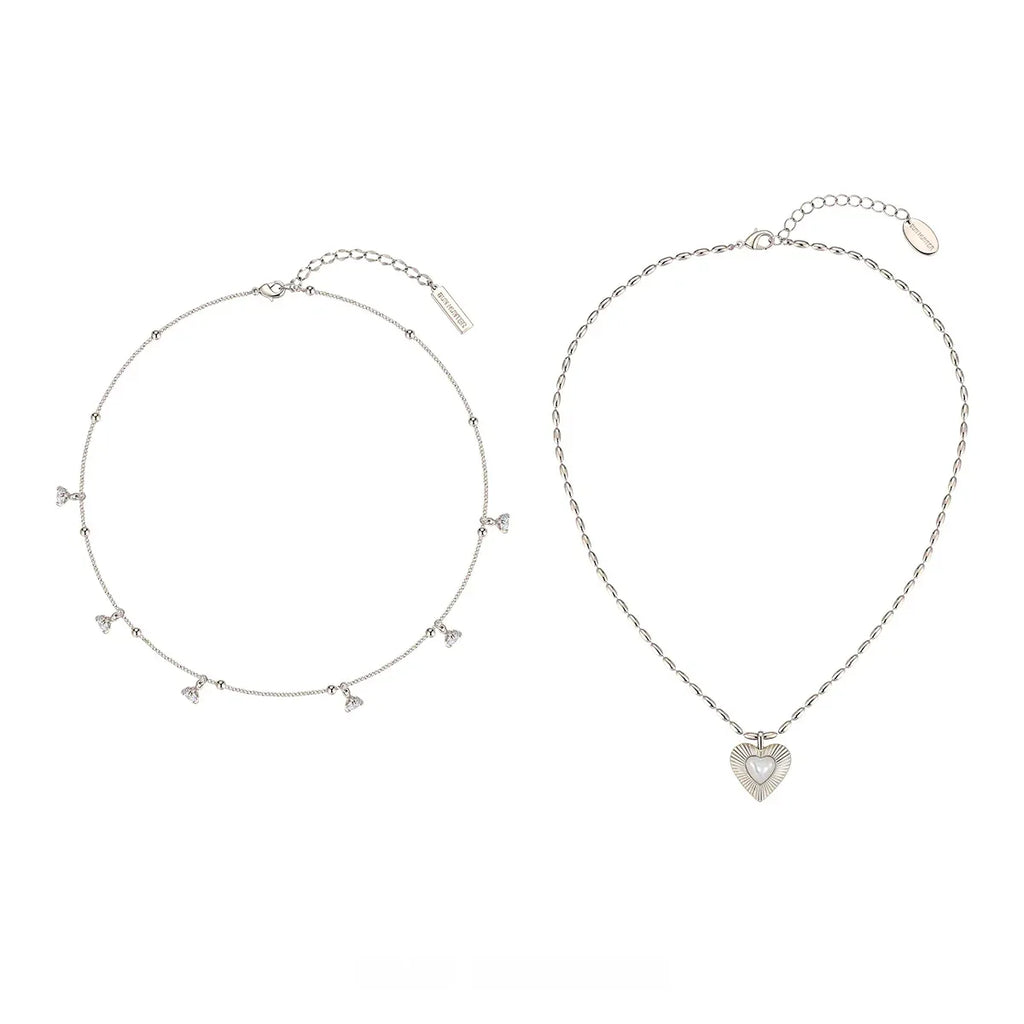 Double-Layer Pearl Heart Necklace — side-by-side views of the layer spacing and heart pendant
