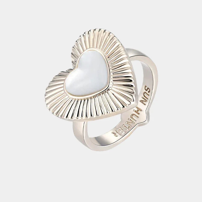 Ridged Pearl Heart Open Ring — isolated angled view of the open ring with a ridged heart frame