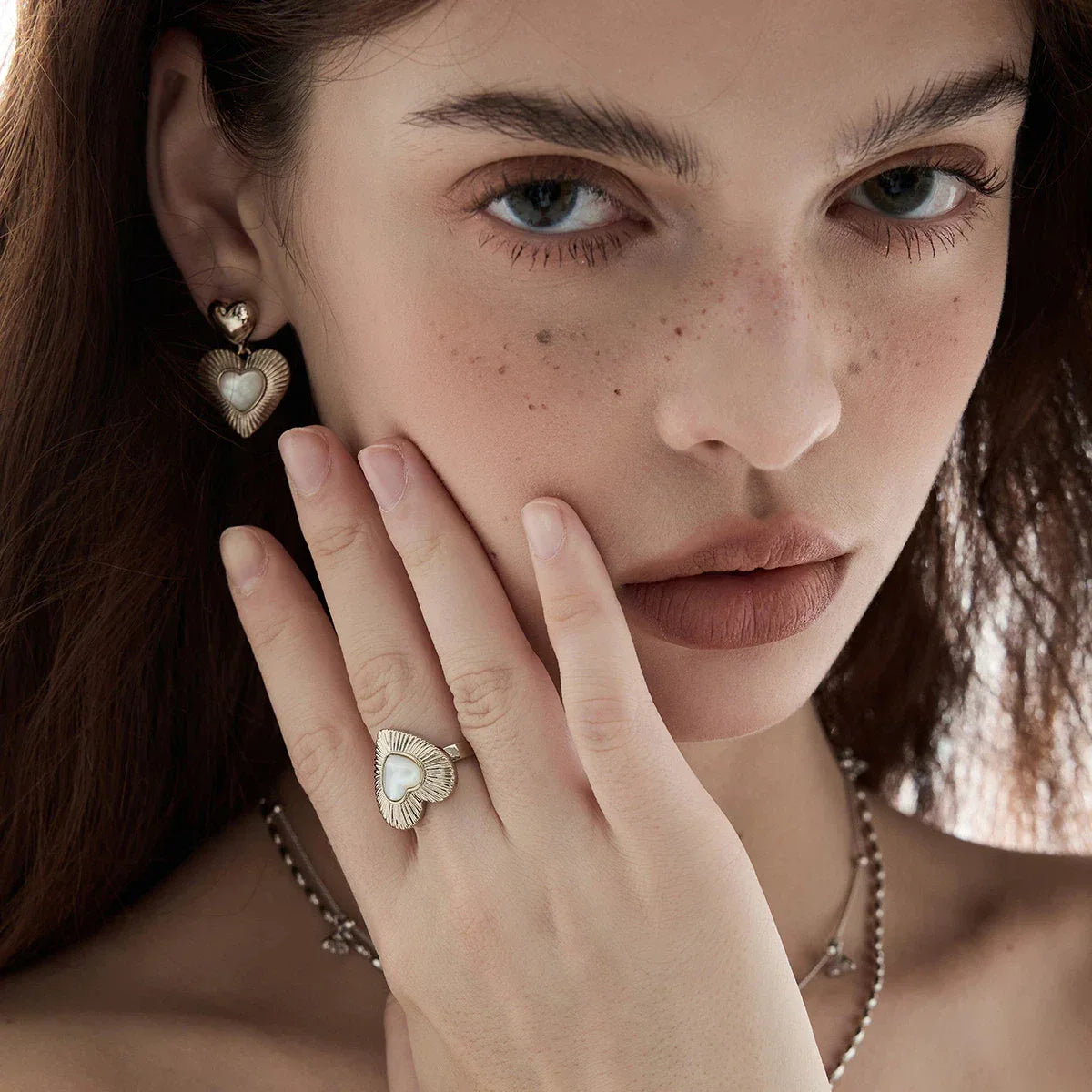 Ridged Pearl Heart Open Ring — alternate hand-worn close-up showing design and scale
