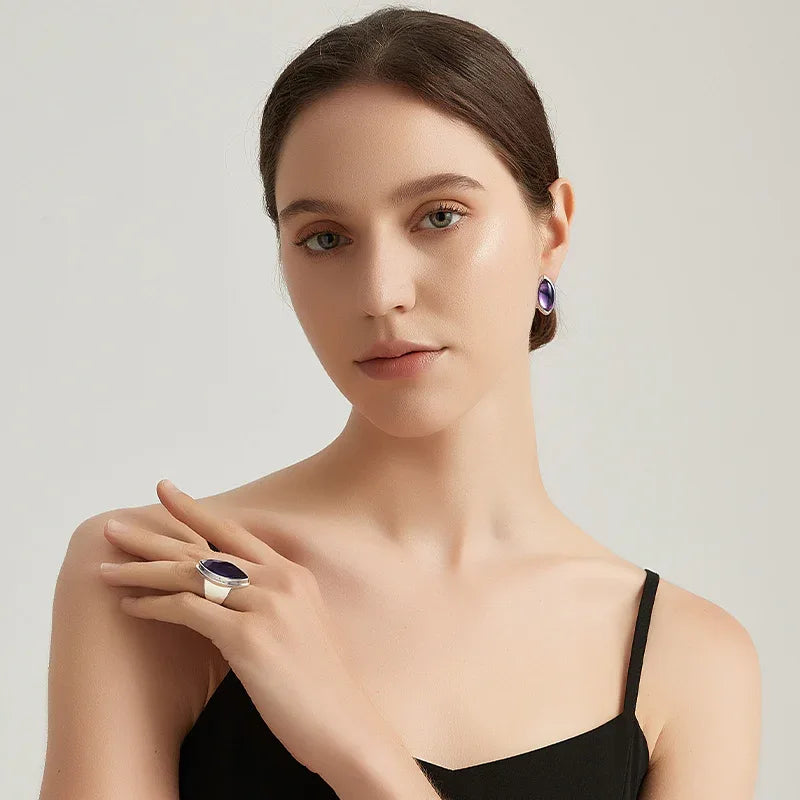 marquise amethyst stud earrings side portrait with the earrings