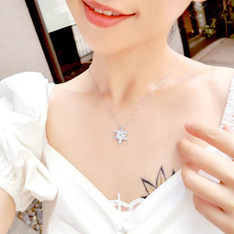 Marquise Aquamarine Snowflake Pendant Necklace styled neckline view showing pendant scale