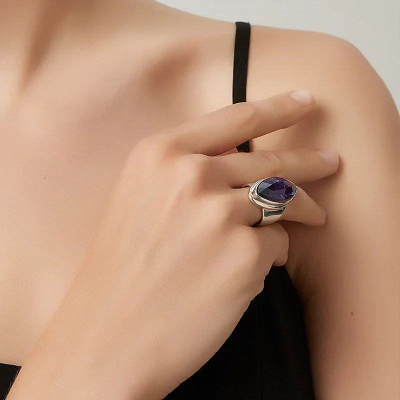 marquise amethyst sculptural ring styled portrait showing the ring for scale