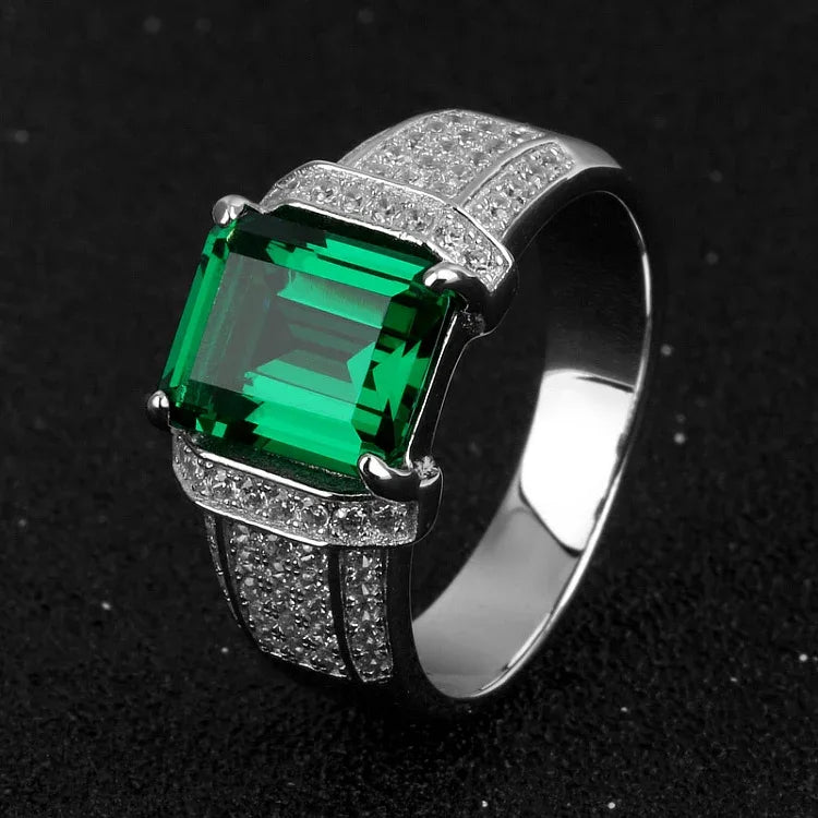 Men's 10 mm Emerald Pave Statement Ring angled product view on a dark background
