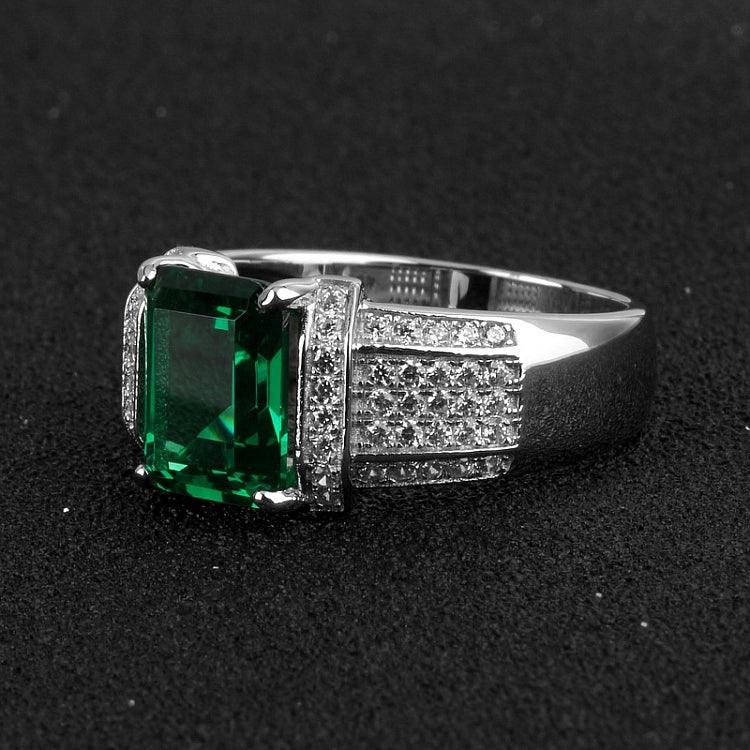Men's 10 mm Emerald Pave Statement Ring worn on the hand in a close-up