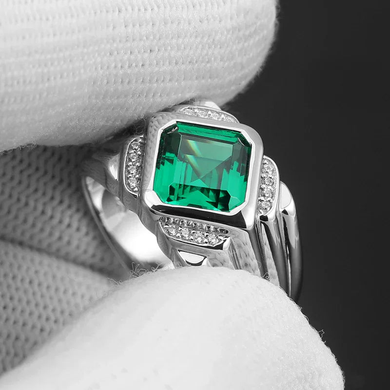 Men's 12 x 13.5 mm Emerald Ring worn on the hand from a second angle