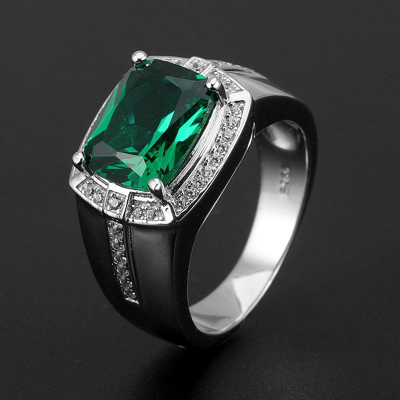 Men's 9 x 11 mm Rectangular Emerald Halo Ring worn on the hand in a close-up