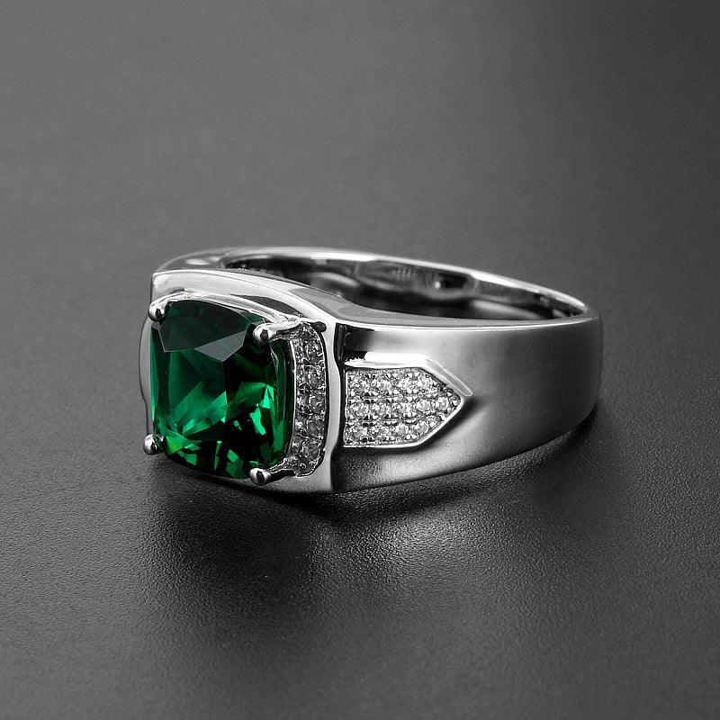 Men's Cushion-Cut Emerald Ring worn on the hand in a close-up