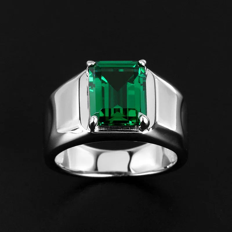 Men's Emerald Minimalist Signet Ring worn on the hand in a close-up