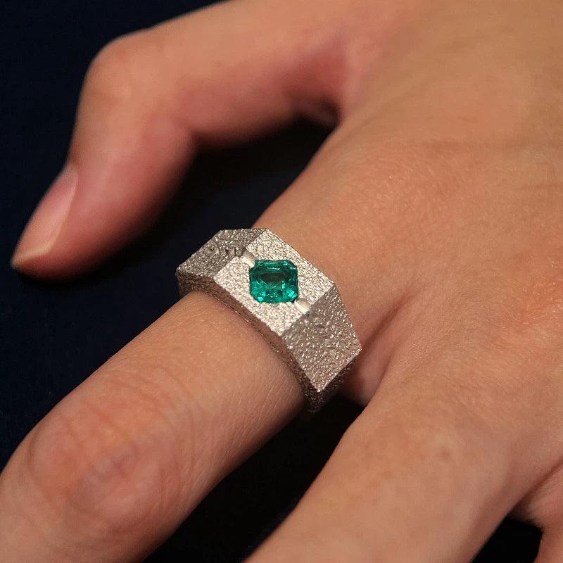 Men's Emerald Textured Signet Ring side profile showing the band and setting