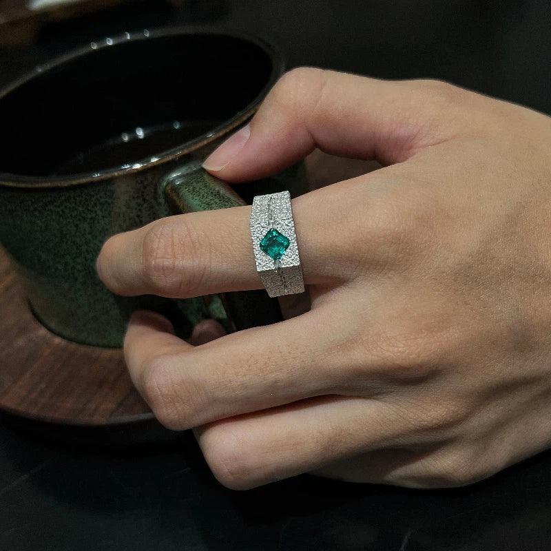 Men's Emerald Textured Signet Ring worn on the hand in a close-up