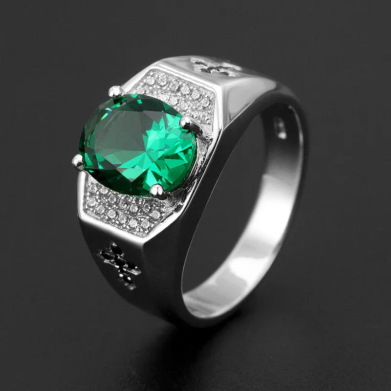 Men's Oval Emerald Fleur-de-Lis Ring worn on the hand from a second angle