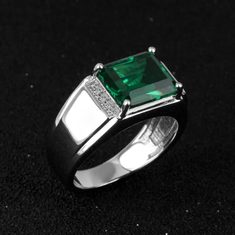 Men's Rectangular Emerald Accent Ring worn on the hand from a second angle