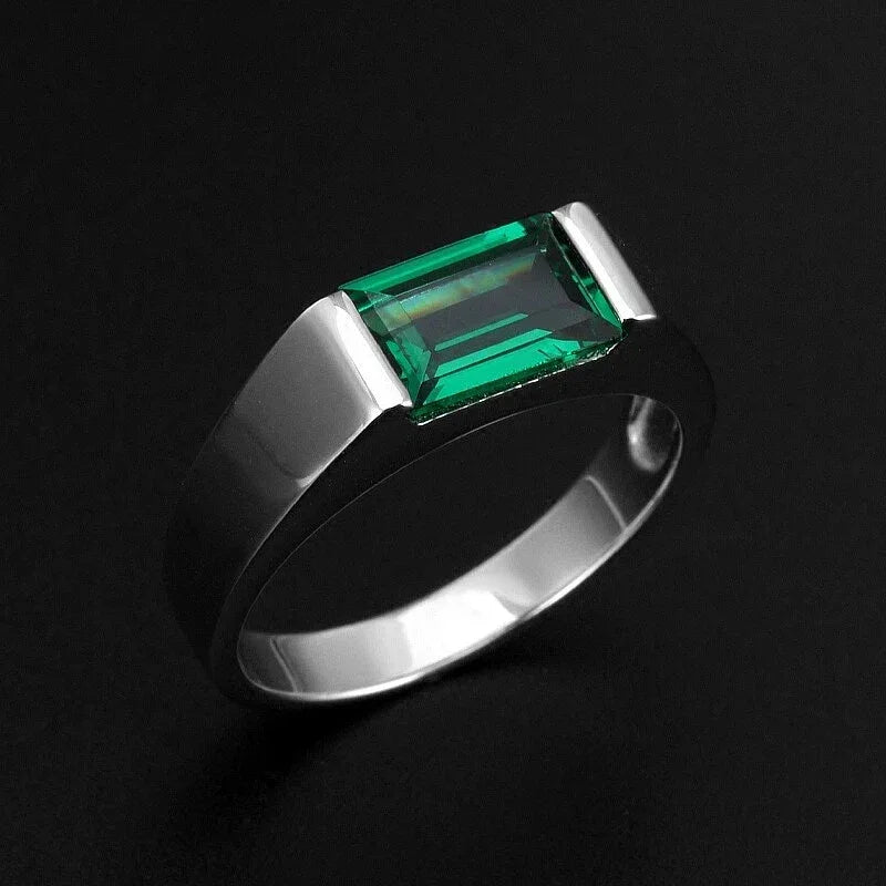 Men's Rectangular Emerald Bezel Ring worn on the hand from a second angle