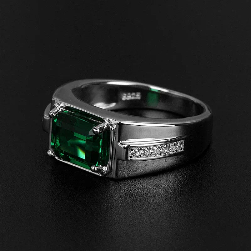 Men's Rectangular Emerald Channel Ring worn on the hand from a second angle