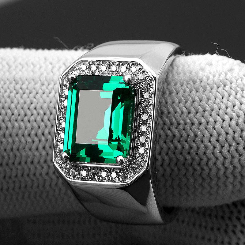 Men's Rectangular Emerald Framed Ring worn on the hand in a close-up