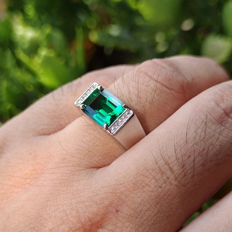 Men's Rectangular Emerald Pave Ring angled product view on a dark background
