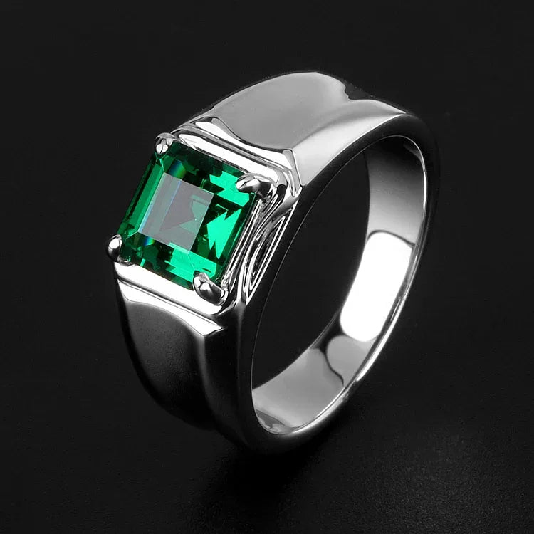 Men's Rectangular Emerald Split-Shank Ring angled product view on a dark background