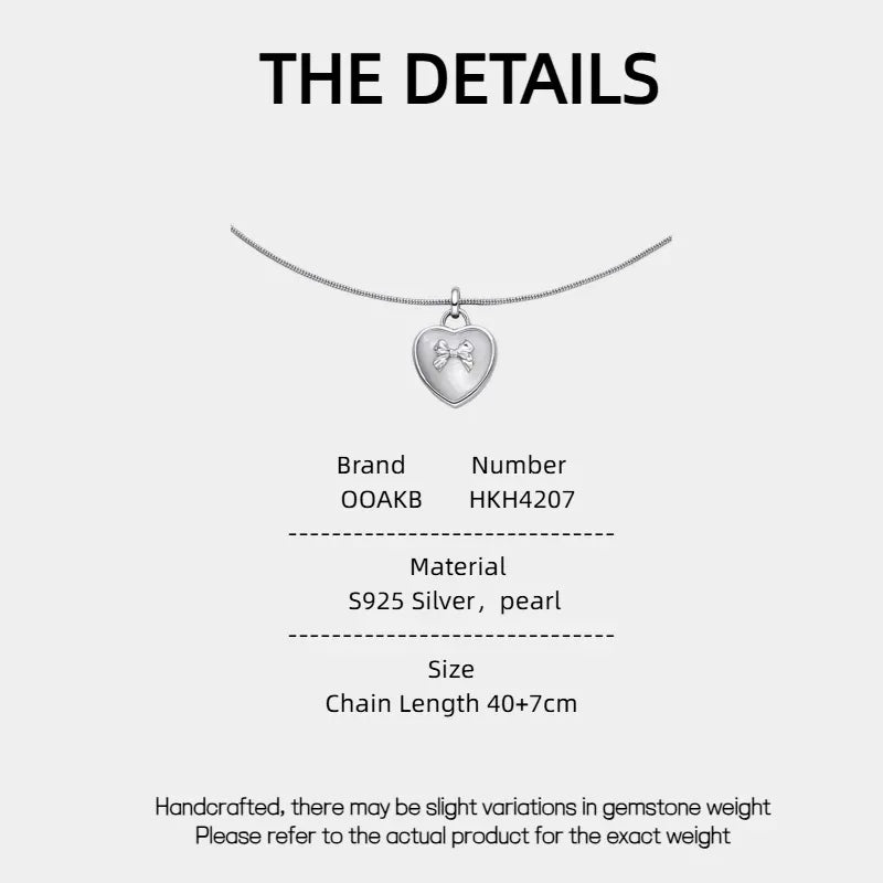 Pearl Heart Pendant Necklace with Bow Detail — specification card with material and size details