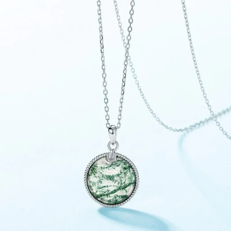 Minimalist and Elegant Round Disc Moss Agate Pendant — angled pendant and chain detail 4