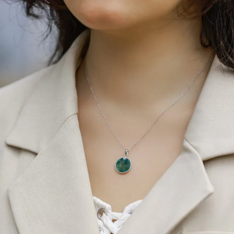 Minimalist and Elegant Round Disc Moss Agate Pendant — neckline scale view 2