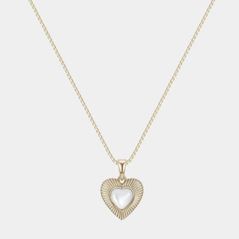 Ridged Pearl Heart Pendant Necklace — front view of small ridged heart pendant on a fine gold-tone chain