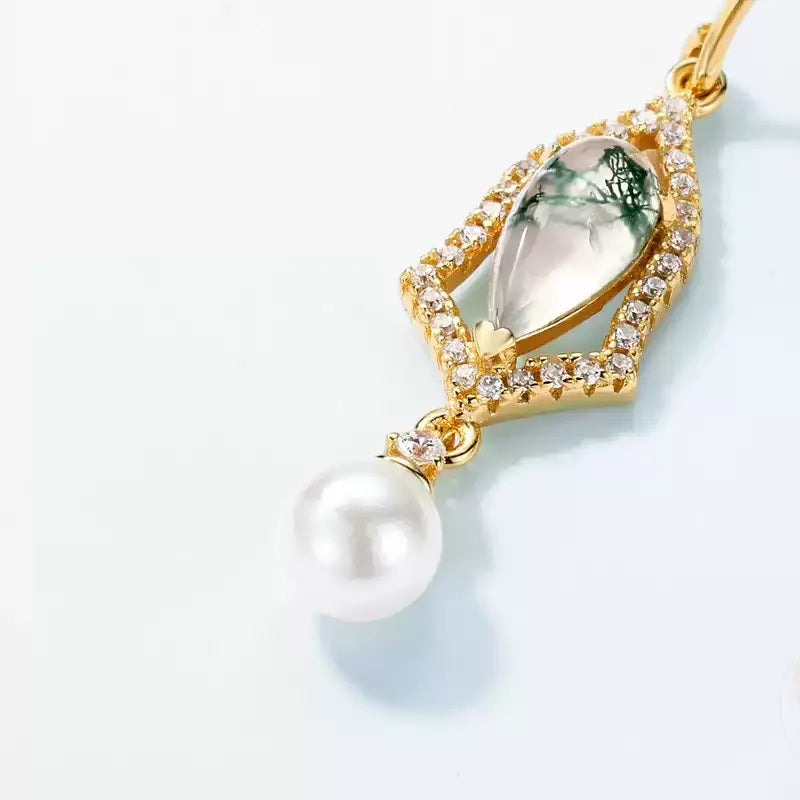 Teardrop Moss Agate Earrings with White Bead Drops — macro view of the moss-like green inclusions, clear halo accents