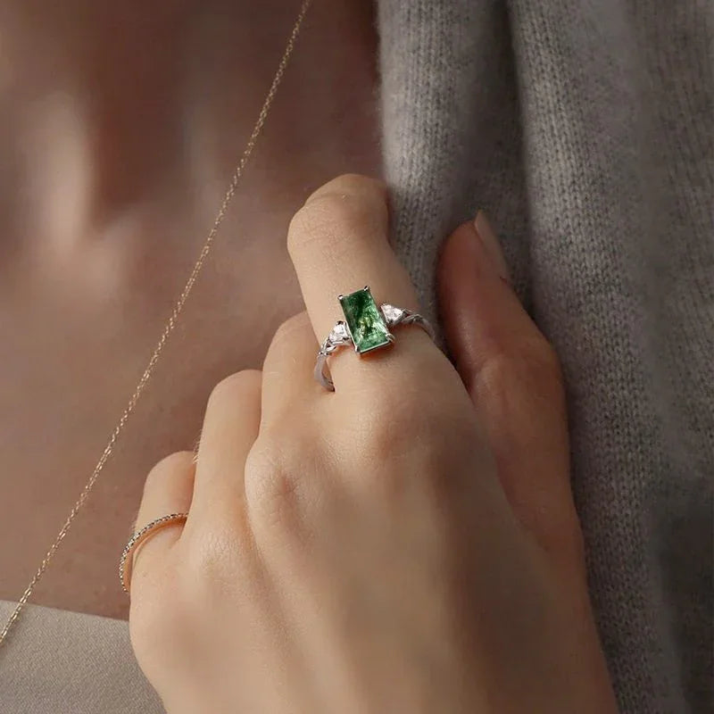 Moss Agate Rectangular Faceted Ring — hand-worn scale view 2