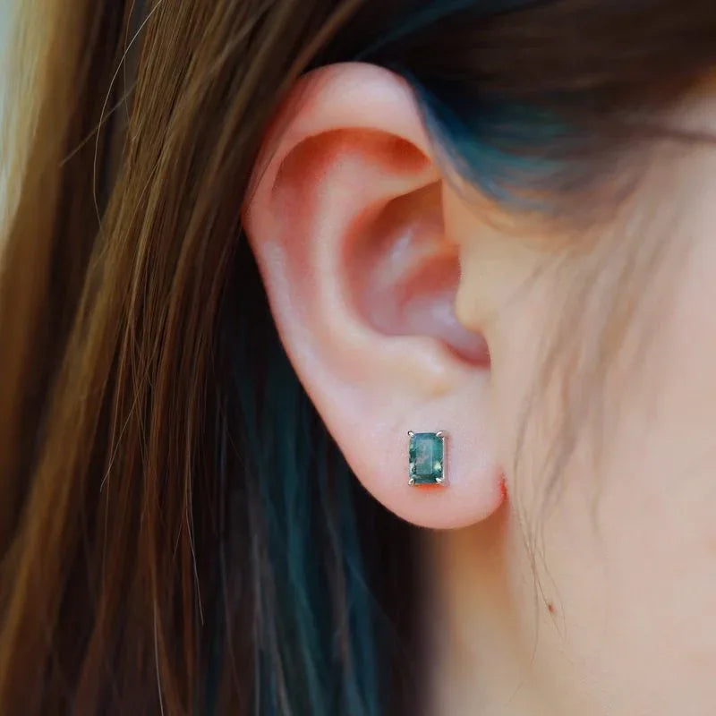 Rectangular Four-Prong Moss Agate Stud Earrings — single stud worn on the ear