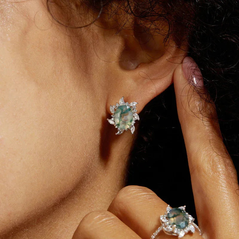 Oval Moss Agate Floral Halo Stud Earrings — single stud worn on the ear and shown with a matching ring