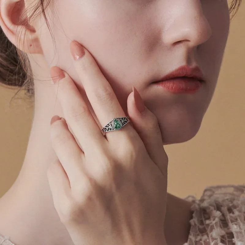 Pear-Shaped Moss Agate Filigree Band Open Ring — ring worn on the hand
